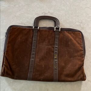 Brown Suede with leather trim laptop bag.  Lovely patterned interior zip pocket